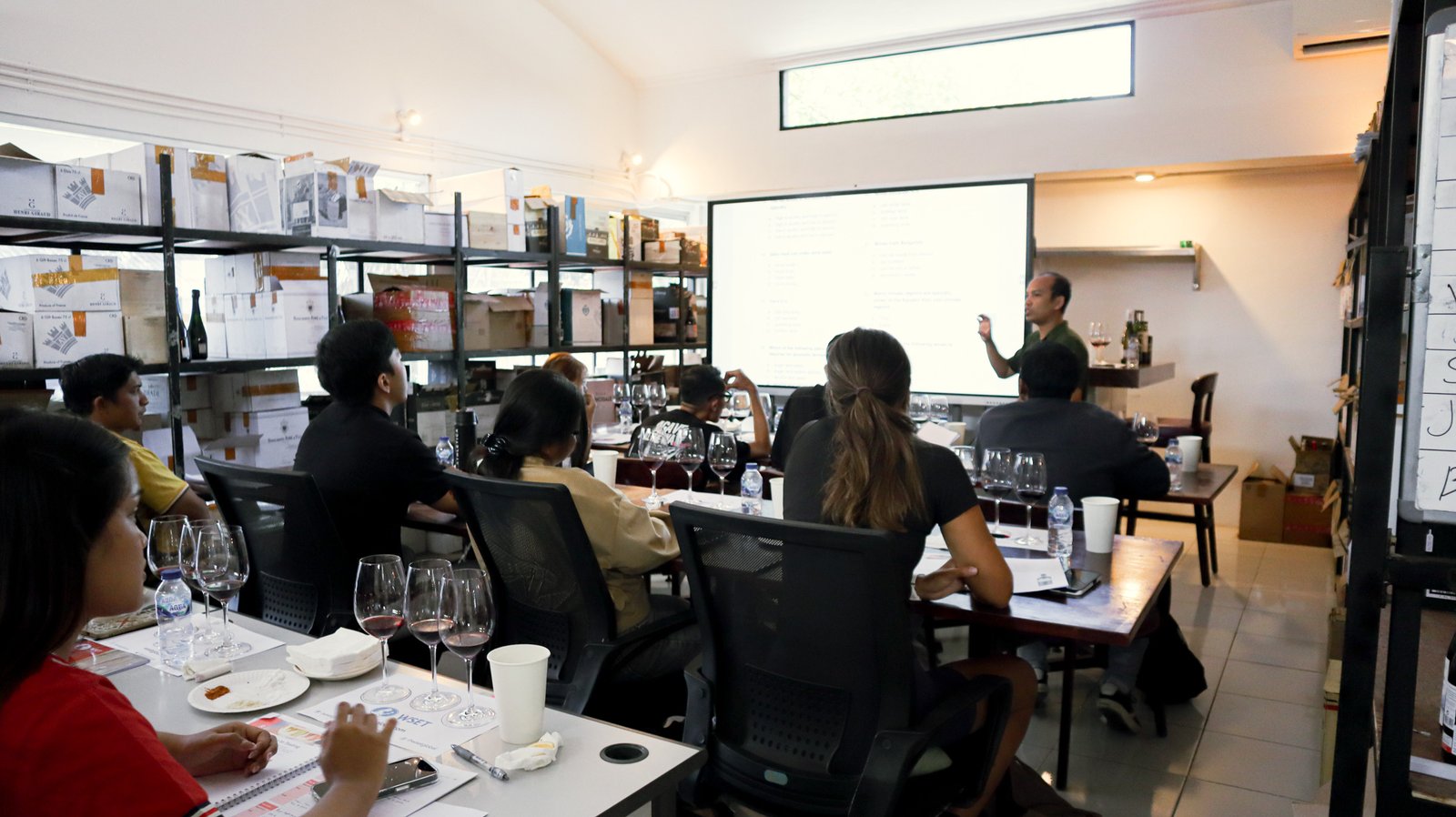 WSET 1 students tasting wines during guided class